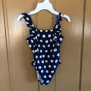 Little girl polka dot swimsuit.